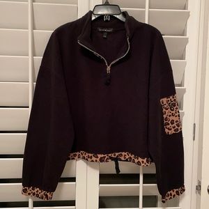 Fleece cropped half zip with leopard trim